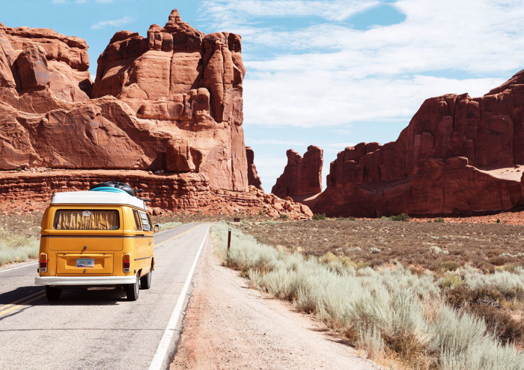 Travel bus full of friends on a road trip to Utah